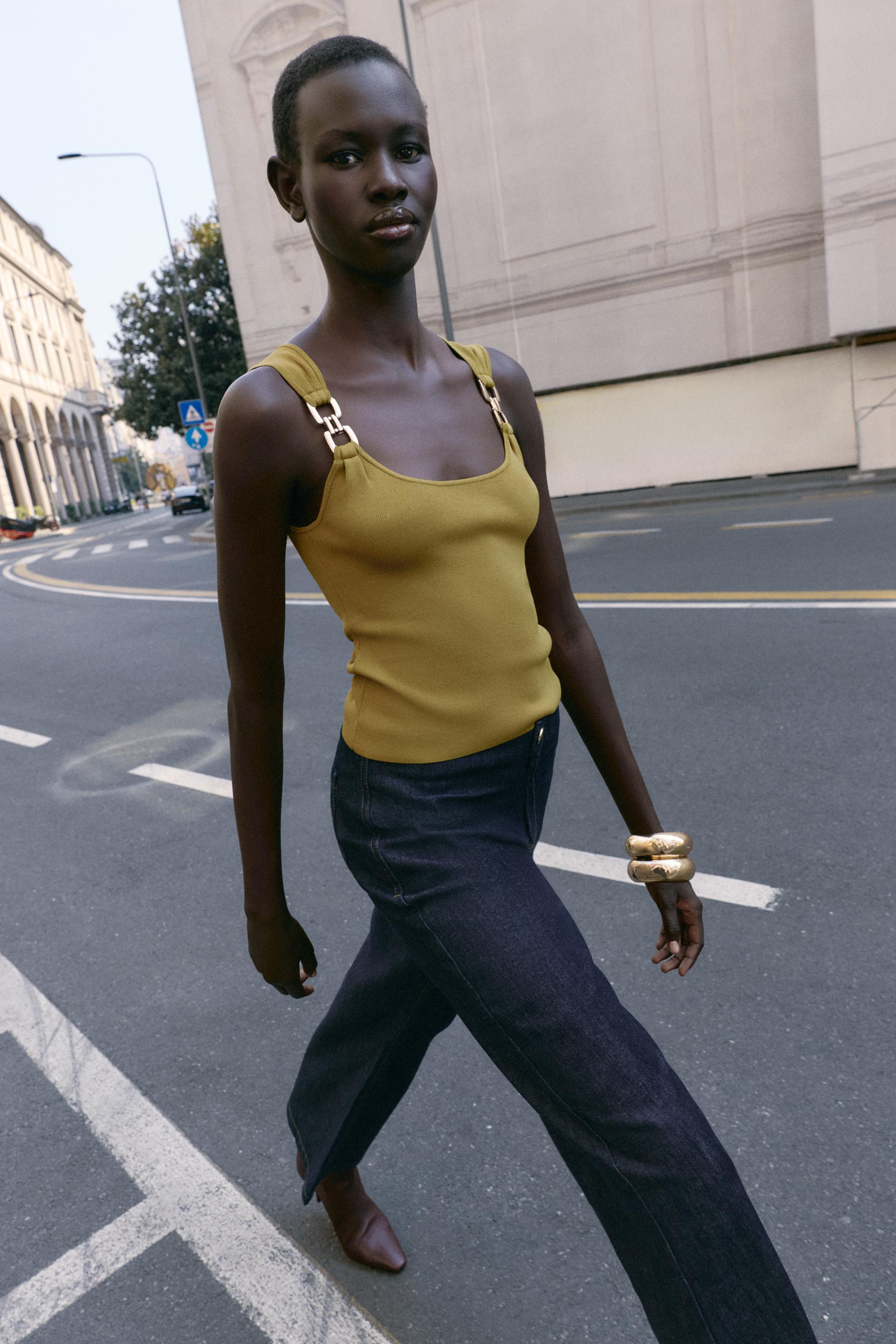 TOP EN MAILLE DÉTAIL MÉTALLIQUE